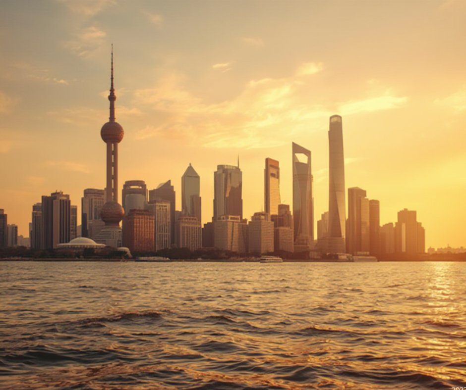 Shanghai Pudong skyline viewed from The Bund waterfront at golden hour