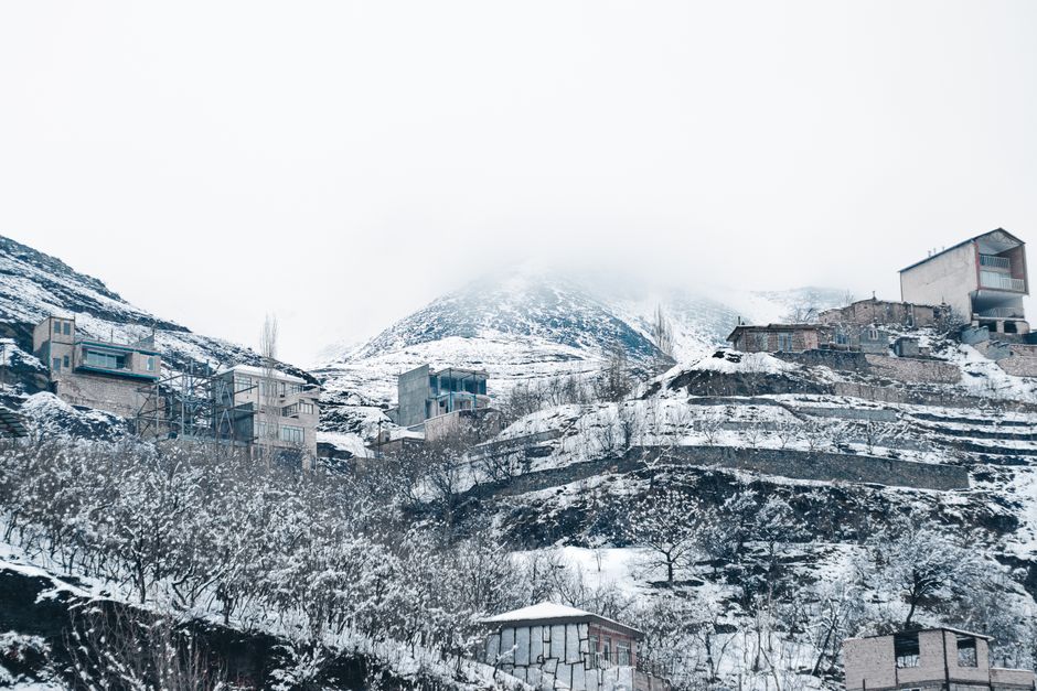 A snow-covered mountain village in winter