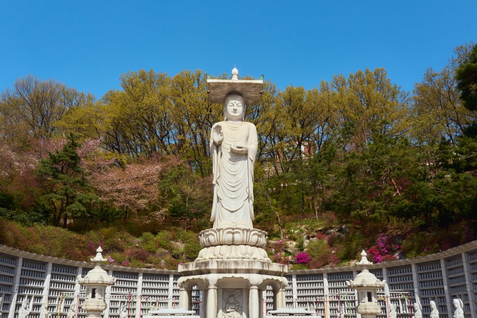 Bongeunsa Temple ancient architecture with modern Seoul skyscrapers behind