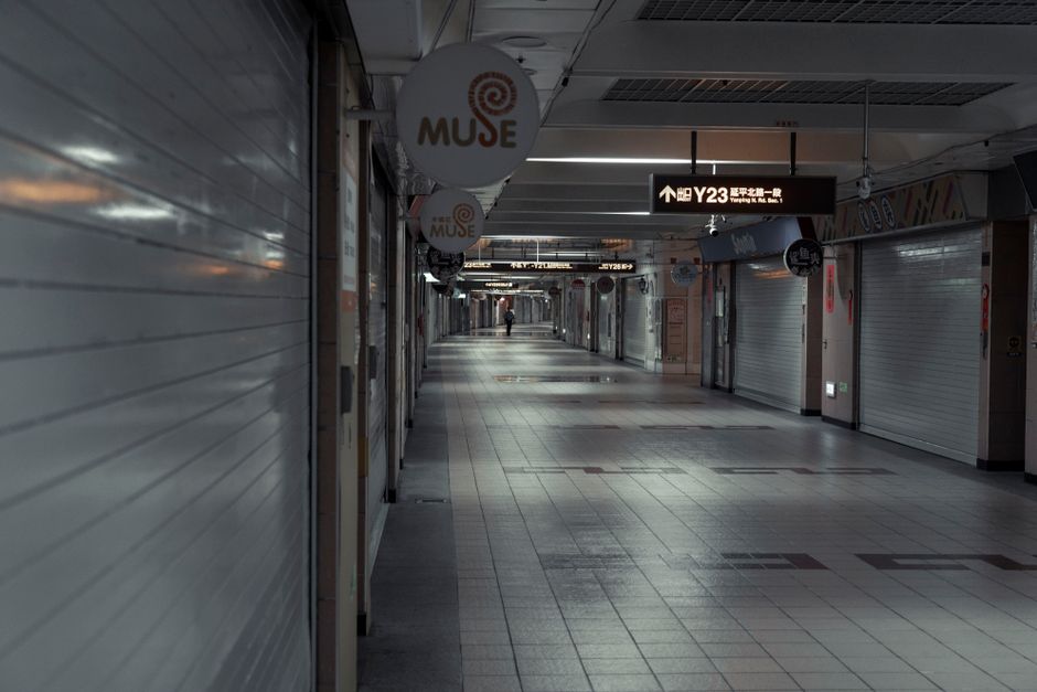 Gangnam station underground corridor with fashion shops and neon signs