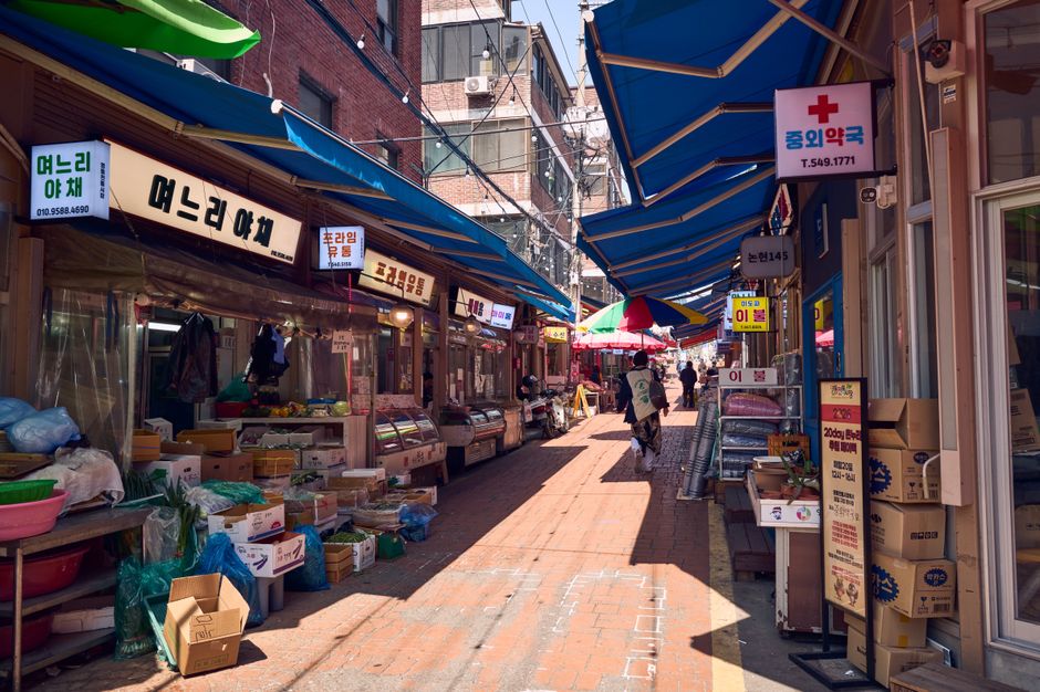Namdaemun Market Seoul crowded shopping alley with stalls